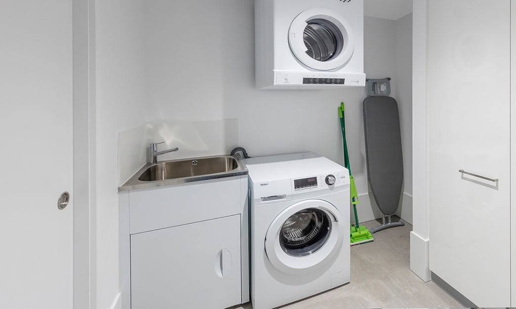 Laundry room equipped with Washer and Dryer